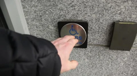 Opening a handicap automatic door. Video stock 41451472