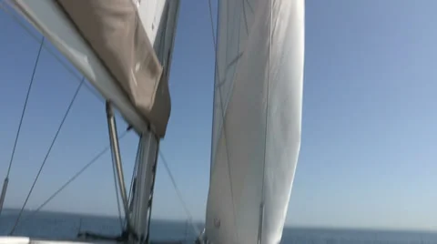 Opening headsail on boat Stock Footage 32324686