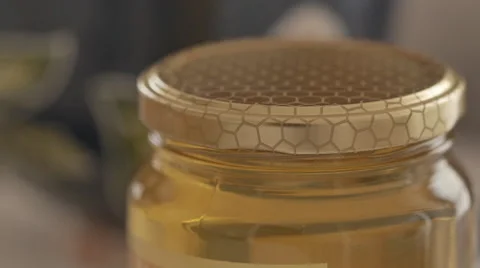 Opening of an honey jar Stock Footage 50615901