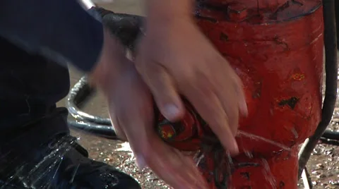 Opening a hydrant by hand Stock Footage 36131434
