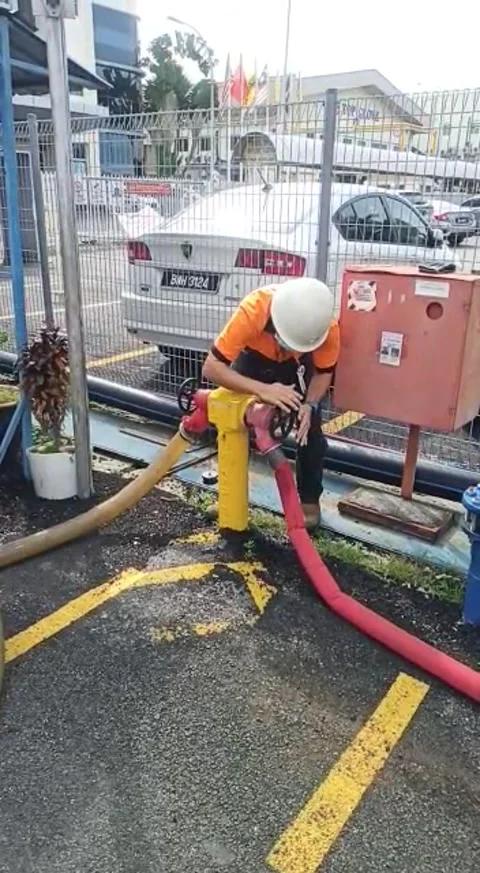 Opening hydrant in slow-mo for fire drill Stock Footage 243399647