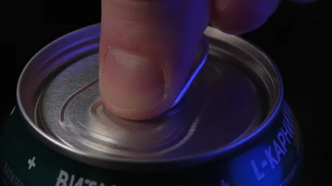 Opening an iron can of soda, a can of lemonade, slow motion Stock Footage 265142967