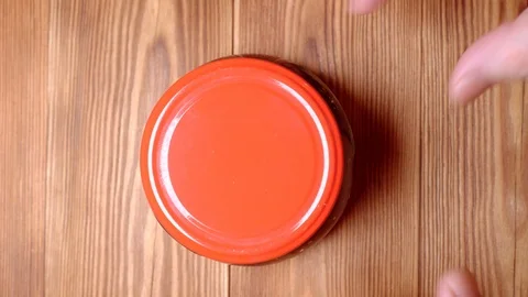 Opening a jar of caviar close up Stock Footage 122309363