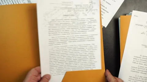 Opening KGB File Folder With Documents About Operation Denver, HIV AIDS Stock-Footage 327457198