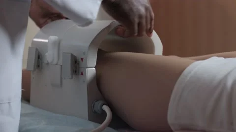 Opening knee mri coil after mri scanning Stock Footage 60237495