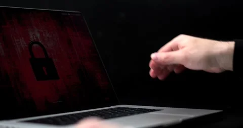 Opening a laptop and adjusting the screen in a well-lit room during the day Stock Footage 325096318