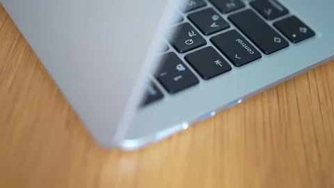 Opening a Laptop Computer to Start Morning Remote Work Stock-Footage 330174775