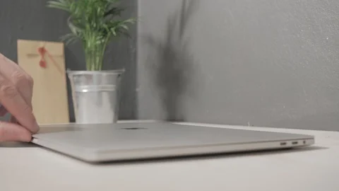 Opening a laptop with a green screen Stock Footage 120594828