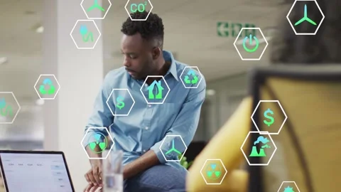 On opening laptop man pointing, hex icons energy, reuse, funds popping while Stock Footage 331701038