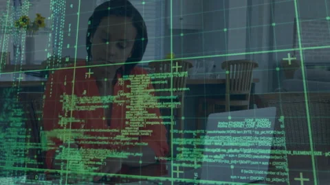 Opening laptop tech developer typing and expanding code overlay while jotting Stock Footage 312407245