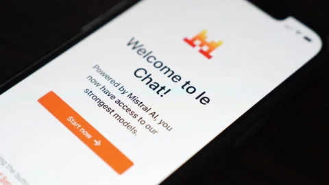Opening the Le Chat AI productivity app on a mobile phone screen. Stock Footage 304169610