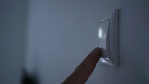 Opening the Light from the Switch in the Office. One Person Turning on the Light Vídeo Stock 233290554