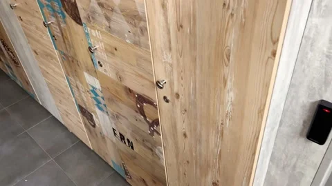 Opening a locker with things with a magnetic key Stock Footage 212176292