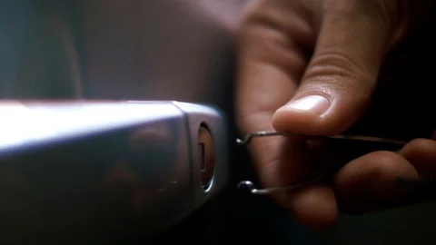 Opening the locking of the car door in the parking lot using a master key Video stock 105159601