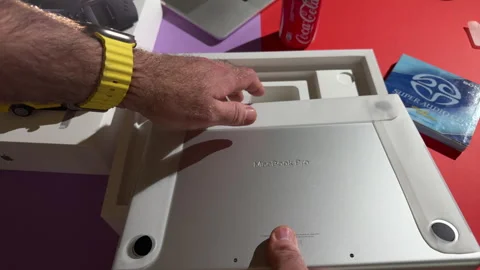 Opening MacBook Pro M4 Max Lid Stock Footage 306049281