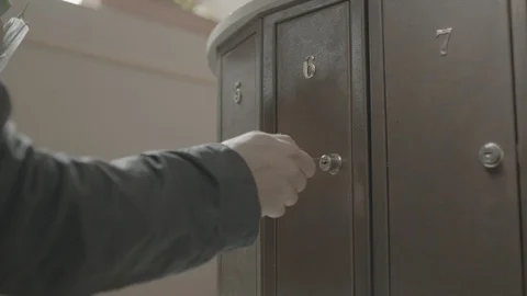 Opening the mail box with the key Stock Footage 90992512