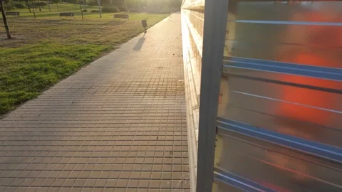Opening Metal Gate at Sunset | Cinematic First Person Walkway 4K Stock Footage 337799470