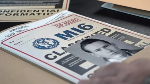 Opening MI6 File Folder With Oleg Gordievsky Photo and Documents, Former KGB 스톡 동영상 327457247