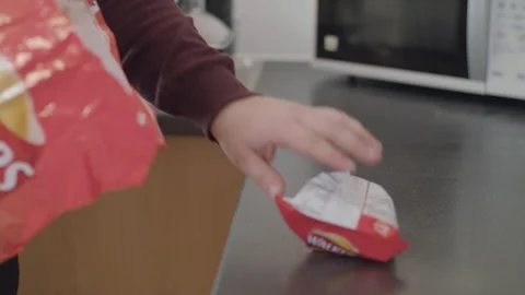 Opening A Multipack Of Crisps and Taking Out Each Packet (Walkers) Stock Footage 95681314