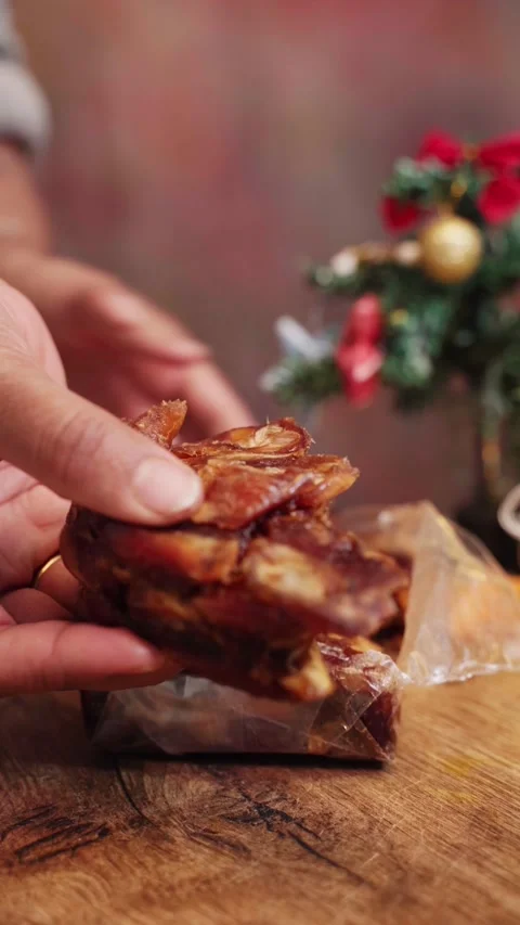Opening a new packet of khajur  or date for making sweet item. Stock Footage 283363245