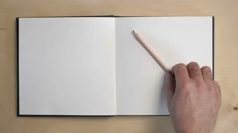 Opening a notebook. Blank pages to insert text and subtitles. The male hand flip Stock Footage 112160692