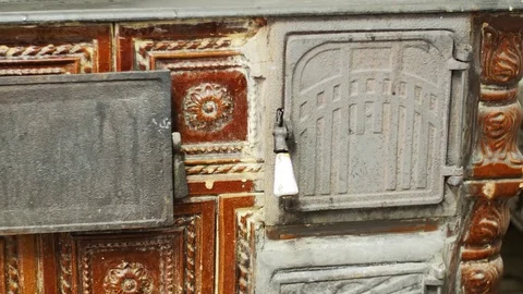 Opening An Old Fireplace Door Stock-Footage 85077597