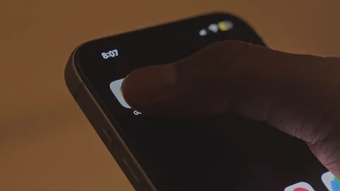 Opening or launching the Google app on a smartphone Stock Footage 333282832
