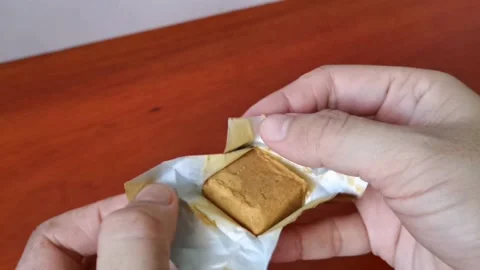 Opening a Pack of Shrimp Cube Stock Footage 231118951