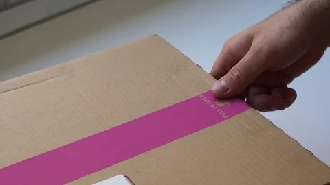 Opening package pull Stock Footage 80929381