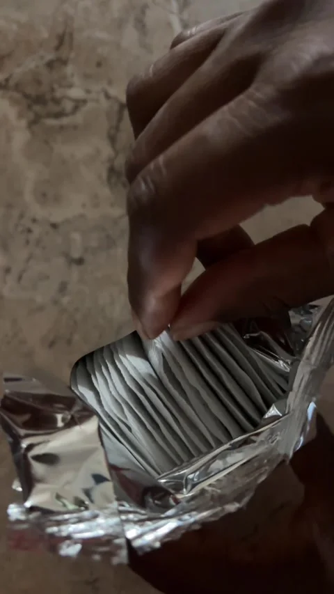 Opening a package of tea Stock Footage 317276310