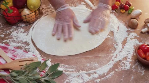 Opening pizza with hands on marble table with fresh fruits and herbs Stock Footage 155057733