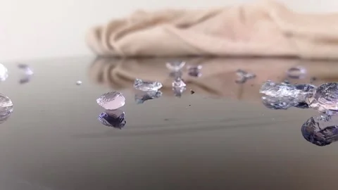 Opening a plastic of white pearls Stock Footage 146255563