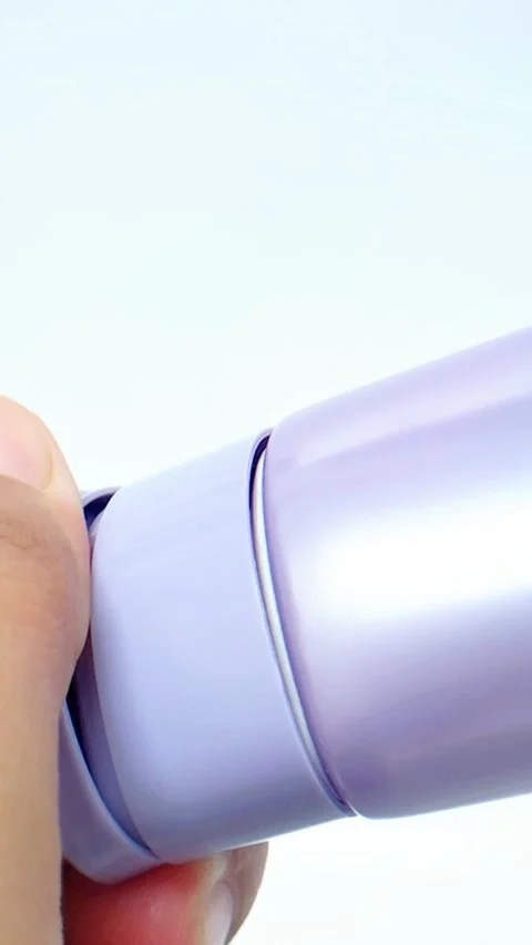 Opening purple serum bottle cap on white background. Close up hands twistin.. Stock Footage 335022697