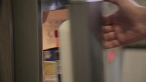 Opening the refrigerator door Stock Footage 158262478