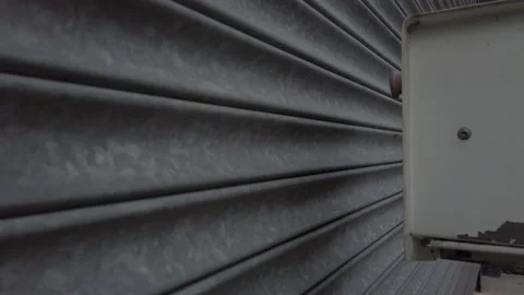 Opening retail metal electronic rolling shutters security steel entrance 動画素材 135002350