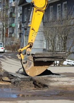 Opening the road surface when eliminating accidents under the ground. Stock Photos