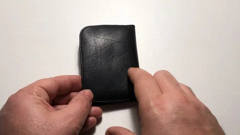 Opening sd cards leather walletac Stock Footage 122103879