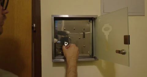 Opening Secure Key Cabinet with Keys Stock Footage 337759806
