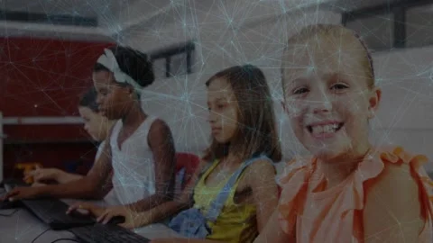 Opening shot capturing three classmates typing class project at computer lab Stock Footage 325964980