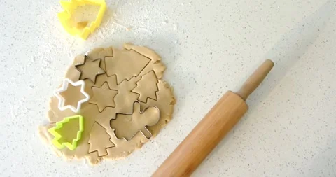 Opening shot showing cookie dough resting on speckled countertop awaiting metal Stock Footage 336367177