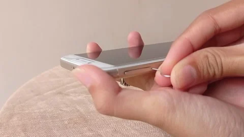 Opening the sim card on a phone Stock Footage 146259218