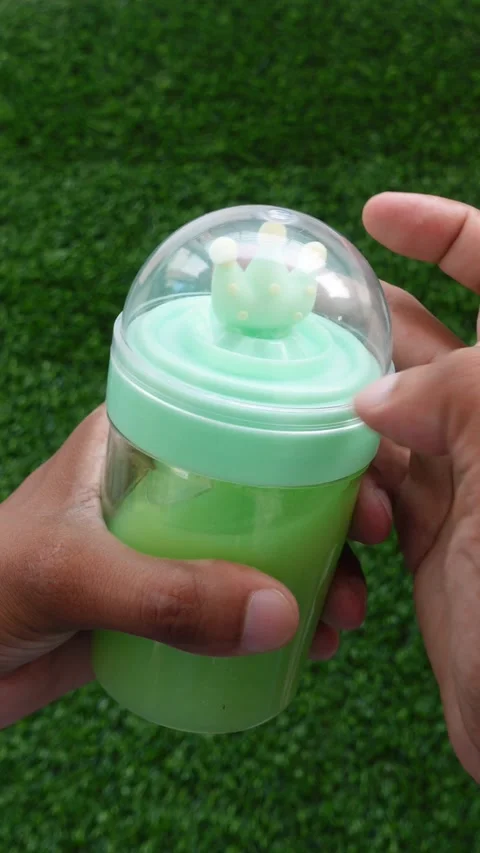 Opening A Slime Box By Turning The Lid Counterclockwise, First Person POV Stock Footage 345953421