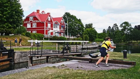Opening sluice gate Stock Footage 94954239