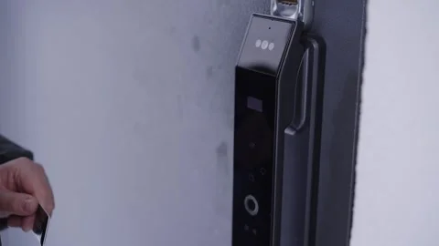 Opening a smart lock via a contactless key Stock Footage 328645388