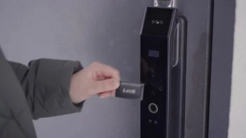 Opening a smart lock via a contactless key Stock Footage 328645403