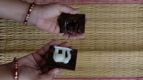 Opening of Sugar mold Stock Footage 146359134