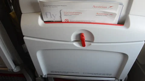Opening table in a plane during flight Stock Footage 22771930