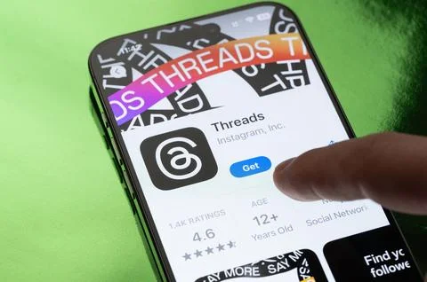 Opening threads app on smartphone Stock Photos