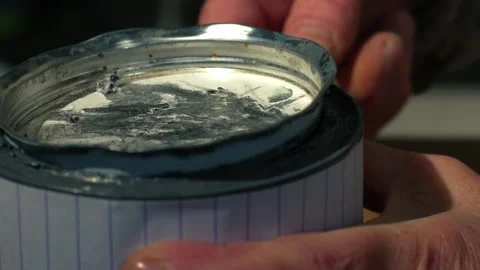 Opening a tin of paint close up Video stock 244732253
