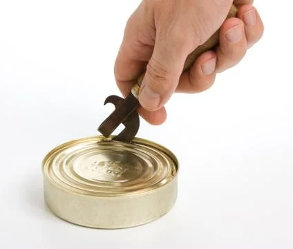 Opening tin Foto stock